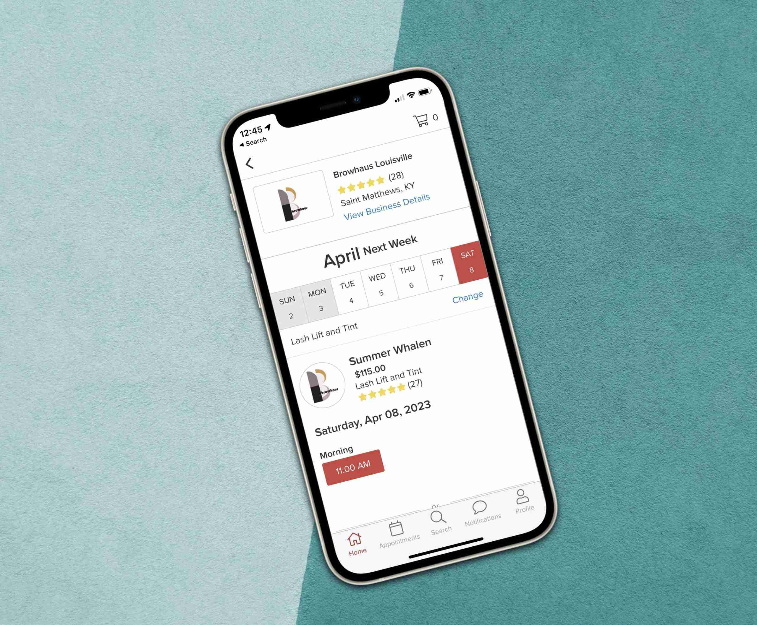 Cellphone displays our booking app